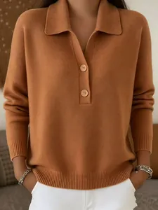 Detailed view of women's ribbed knit polo sweater featuring a classic collar and buttons