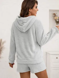 Back view of a cozy light grey plush hooded sweatshirt and shorts loungewear set