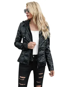 Detail of women's black hooded faux leather jacket with zipper pockets for autumn style.