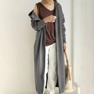 Full-length view of the grey oversized hooded zip-up fleece hoodie for women.
