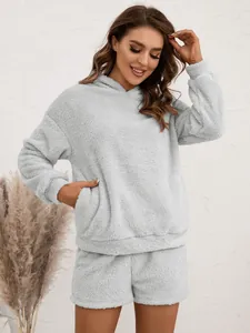 Soft and cozy two-piece fuzzy fleece loungewear set with hooded sweatshirt and shorts