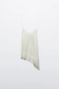 Elegant cream asymmetrical silk camisole featuring delicate floral lace trim detail
