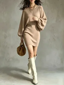 Elegant round neck loose knit sweater dress for women in khaki beige styled with boots