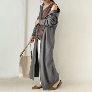 Stylish women's oversized long fleece lined hooded sweatshirt robe zip jacket in grey.