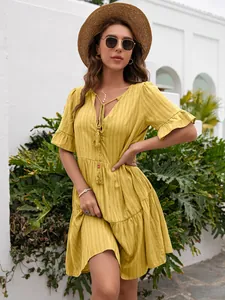 Stylish yellow V-neck summer dress featuring ruffled sleeves and a tiered skirt design