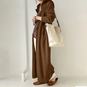 Full-length detail of a long hooded brown sweatshirt robe with casual loose fit
