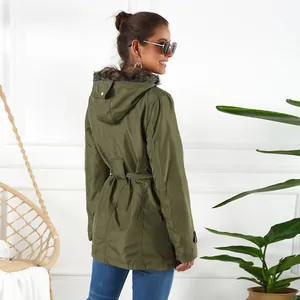 Back view of a women's olive green parka with faux fur hood and waist belt detail