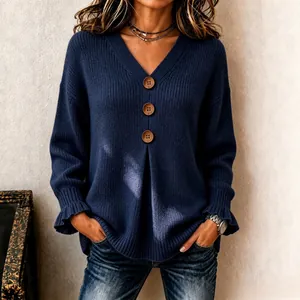 Elegant navy blue V-neck knit sweater with stylish ruffled cuffs and decorative wood buttons