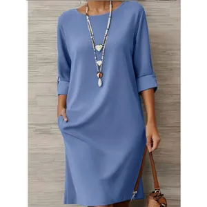 Robe bleue élégante à col rond avec demi-manches et poches latérales femme