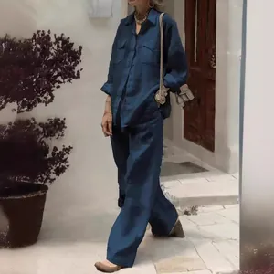 Ensemble élégant deux pièces bleu marine pour femme avec chemise longue et pantalon large