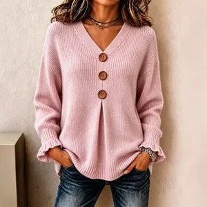 Elegant pink V-neck knit sweater for women featuring stylish ruffle cuffs and wooden buttons