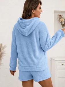 Back view showing soft texture of light blue fuzzy hooded loungewear set for women