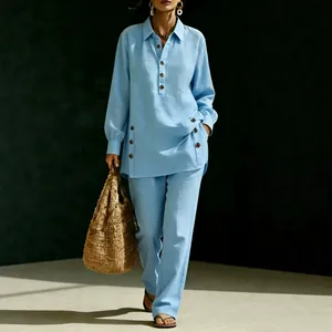 Light blue two-piece linen set with long-sleeve shirt and casual pants for women
