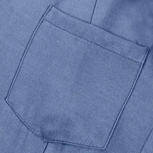 Close-up view of the front pocket stitching on this blue denim casual maxi dress for women