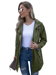Close-up of women's olive green hooded raincoat jacket featuring a drawstring waist