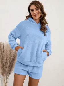 Women's light blue fuzzy sherpa hooded sweatshirt and shorts cozy loungewear set detail