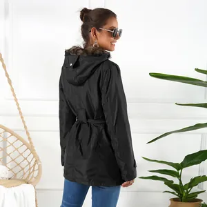 Detailed back view of a black mid-length hooded parka with fur collar and waist belt