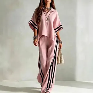 Pink short-sleeve shirt and wide-leg trousers two-piece set with black stripes