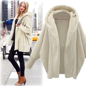 Detailed view of women's oversized plush hooded jacket in cream with ribbed cuffs.