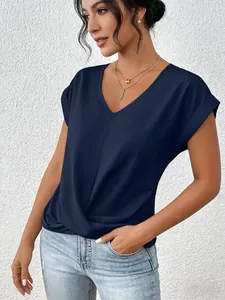 Front view of elegant navy blue V-neck blouse featuring stylish twisted hem detail