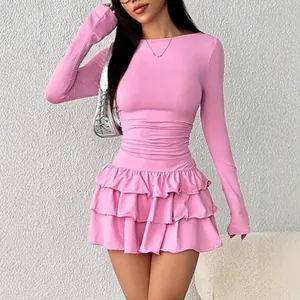 Elegant pink long-sleeved ruffled mini dress with a slim-fit bodycon silhouette for women.