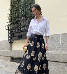 Elegant bohemian floral print high waist maxi skirt styled with white shirt and belt