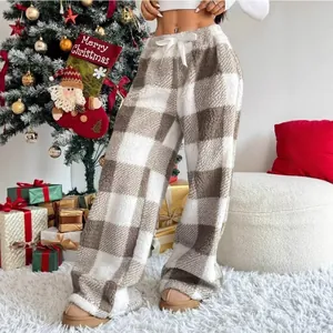 Detail view of cozy brown plaid wide-leg lounge pants with white drawstring