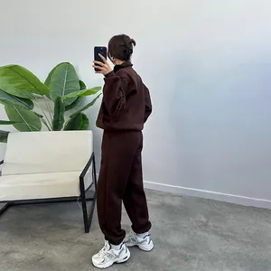 Rear view of brown fleece tracksuit with zip-up sweatshirt and oversized sweatpants