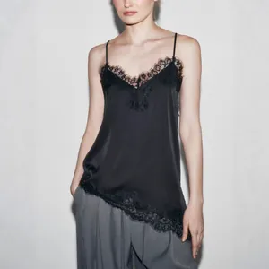 Elegant black satin camisole with asymmetrical lace trim and dainty straps for summer.