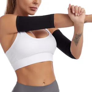 Close-up view of black sauna arm bands worn during stretching for fitness training