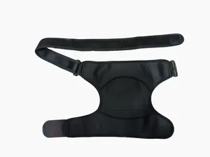 Close-up of a black adjustable sports shoulder support brace with compression straps