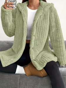 Detailed view of a cozy sage green hooded plush jacket featuring soft fleece texture