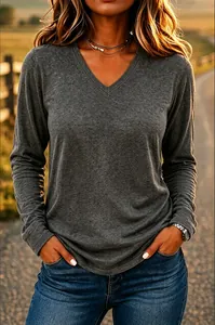 Close-up of a women's casual V-neck long sleeve t-shirt in soft heathered charcoal gray.