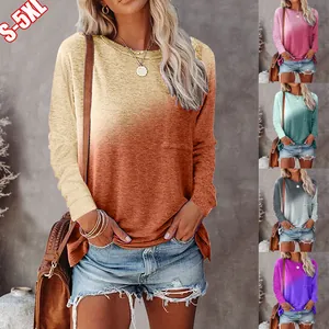 Detailed view of women's gradient long sleeve t-shirt with pocket and round neck.