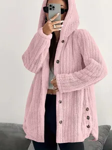 Detail view of pink hooded fuzzy fleece coat featuring decorative buttons and loose fit