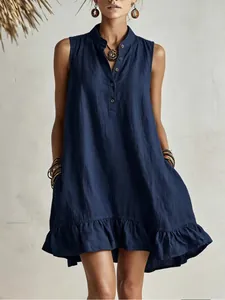 Detailed view of a navy blue sleeveless stand collar dress with elegant ruffle hem