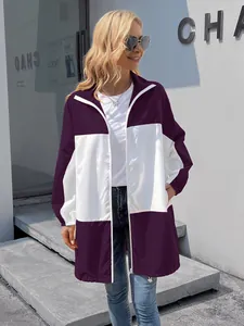 Outdoor fashion photography of women's purple and white color-block waterproof hooded jacket