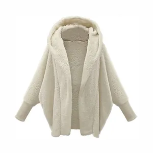 Close-up view of the soft white fleece texture and ribbed cuffs of this hooded jacket