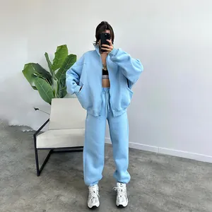 Stylish light blue oversized fleece hoodie and jogger two-piece tracksuit set for women