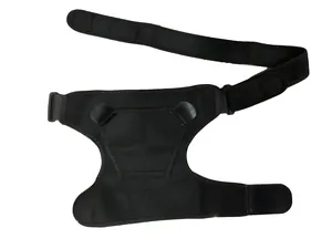 Detail of black adjustable sports shoulder brace with reinforced stitching and ice pack pouch