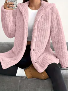 Cozy pink hooded fleece jacket with soft teddy texture and functional button closure.