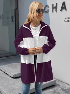Full shot of a purple and white color-block waterproof hooded jacket on a model