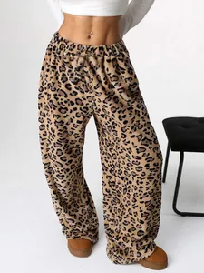 Trendy leopard print wide leg trousers with high waist and floor-length fit.