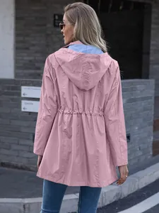 Rear view detail of women's pink hooded mid-length drawstring raincoat