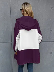 Back view of purple and white color-block hooded waterproof outdoor jacket for women