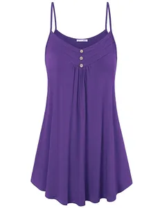 Macro view of purple V-neck camisole featuring three decorative buttons and pleated design