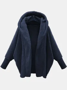 Close-up of navy blue fuzzy hooded jacket with soft fleece texture detail