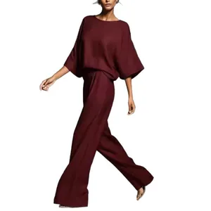 Elegant burgundy linen two-piece set with bell sleeves and wide-leg trousers for summer