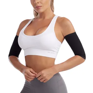 Woman wearing black sweat arm trimmers for fitness and sauna arm training exercises.