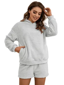 Detail of gray plush fleece hooded sweatshirt and shorts loungewear set for women
